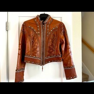 Double D Ranch vintage leather jacket with studding and stitching details.